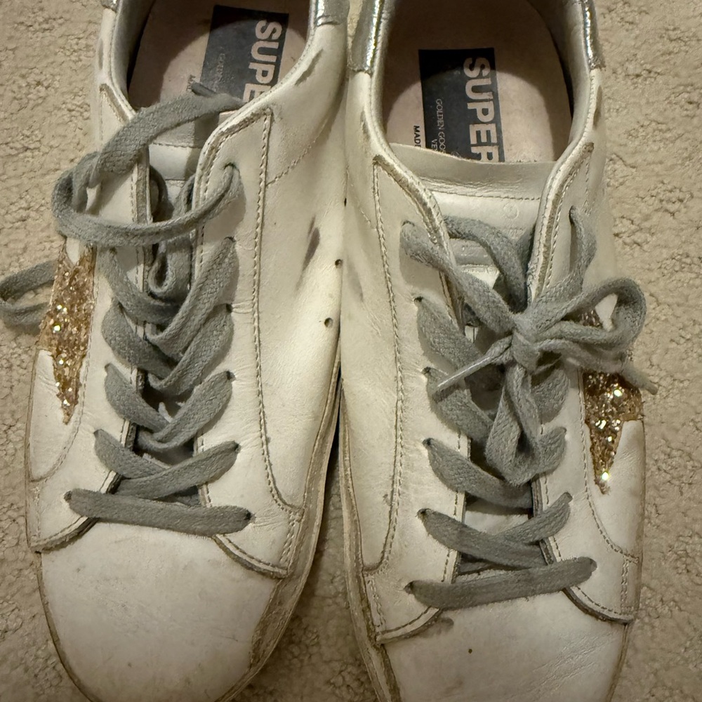 Golden Goose. 
 White and Gold Sneakers Classic Low-Top Design
